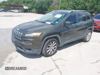 2016 Jeep Cherokee Limited z VIN 1C4PJLDB2GW136260, wystawiony jako IAAI lot #42751413 z przebiegiem 289 997 mil mil oraz . Historia ofert i sprzedaży dostępna na DreamBid. Obrazek 2.