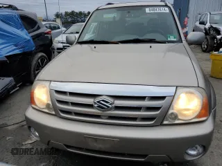 2004 Suzuki XL7 LX z VIN JS3TX92V744100442, wystawiony jako Copart lot #84847614 z przebiegiem 82 751 mil mil oraz Szkody całkowita. Historia ofert i sprzedaży dostępna na DreamBid. Obrazek 5.