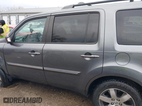 2012 Honda Pilot Touring with VIN 5FNYF4H98CB065003, listed as a IAAI auction lot 41989829 with 91,607 mi miles and . Bid and sale history available at DreamBid. Image 14.