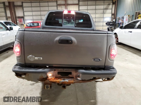 2002 Ford F-150 Harley Davidson with VIN 1FTRW07392KE05237, listed as a Copart auction lot 87451334 with 175,986 mi miles and Salvage Title. Bid and sale history available at carsss.com. Image 6.