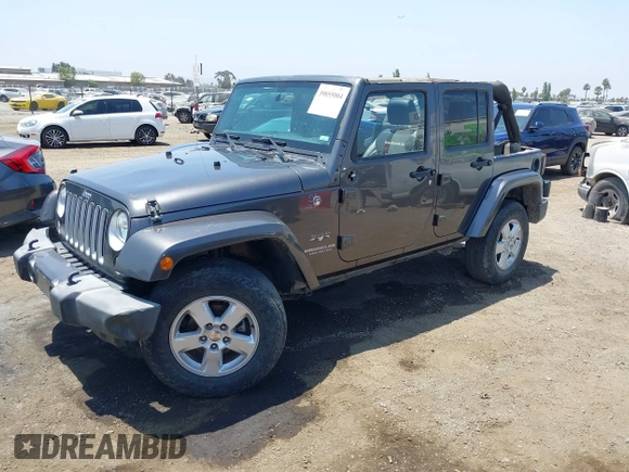 2016 Jeep Wrangler Unlimited Sahara with VIN 1C4HJWEG2GL273507, listed as a IAAI auction lot 39855004 with 87,011 mi miles and . Bid and sale history available at DreamBid. Image 17.