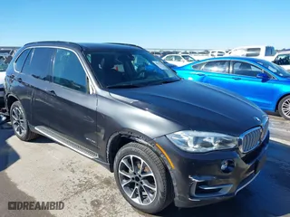 2015 BMW X5 sDrive35i with VIN 5UXKR2C59F0H37452, listed as a IAAI auction lot 40912358 with 101,569 mi miles. Bid and sale history available at carsss.com. Image 1.