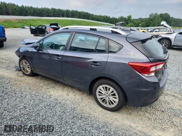 2018 Subaru Impreza Premium with VIN 4S3GTAD64J3715454, listed as a Copart auction lot 64798345 with 63,467 mi miles and Salvage title. Bid and sale history available at DreamBid. Image 2.