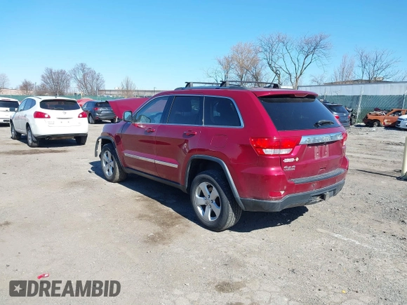 2012 Jeep Grand Cherokee Laredo with VIN 1C4RJFAG4CC297151, listed as a IAAI auction lot 41903618 with 222,357 mi miles. Bid and sale history available at carsss.com. Image 3.