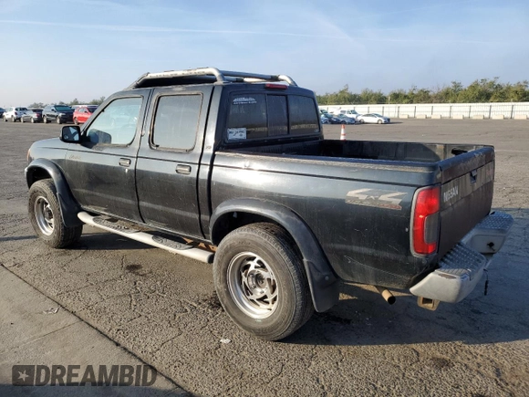 2000 Nissan Frontier XE z VIN 1N6ED27Y2YC369211, wystawiony jako Copart lot #80594884 z przebiegiem 225 194 mil mil oraz Czysty tytuł • Clean title. Historia ofert i sprzedaży dostępna na DreamBid. Obrazek 2.