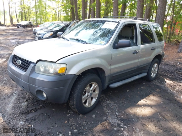2007 Ford Escape XLT with VIN 1FMCU93167KA51832, listed as a IAAI auction lot 42115125 with 148,584 mi miles. Bid and sale history available at carsss.com. Image 2.