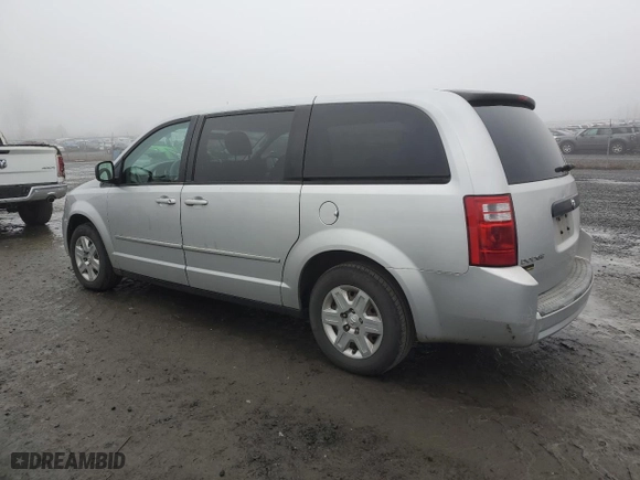2009 Dodge Grand Caravan SE with VIN 2D8HN44EX9R666305, listed as a Copart auction lot 86133974 with 152,400 mi miles and Salvage Title. Bid and sale history available at carsss.com. Image 2.