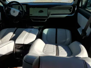 2022 Rivian R1T Adventure Package with VIN 7FCTGAAA6NN013037, listed as a Copart auction lot 75548964 with 8,877 mi miles and Salvage Title. Bid and sale history available at carsss.com. Image 8.