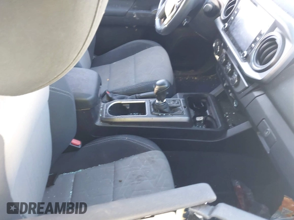 2021 Toyota Tacoma SR with VIN 3TYCZ5AN2MT039450, listed as a IAAI auction lot 40457613 with 54,176 mi miles and . Bid and sale history available at DreamBid. Image 5.