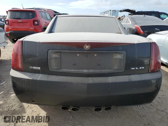 2006 Cadillac XLR z VIN 1G6YV36A965600309, wystawiony jako Copart lot #73937584 z przebiegiem Nie podano mil oraz Szkoda całkowita • Salvage title. Historia ofert i sprzedaży dostępna na DreamBid. Obrazek 6.