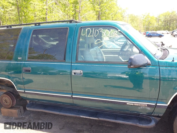 1997 GMC Suburban with VIN 3GKFK16R5VG508908, listed as a IAAI auction lot 42103068 with 264,446 mi miles and . Bid and sale history available at DreamBid. Image 14.