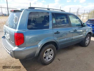 2005 Honda Pilot EX-L with NAVI with VIN 2HKYF18785H565681, listed as a IAAI auction lot 41739543 with 115,549 mi miles. Bid and sale history available at carsss.com. Image 4.