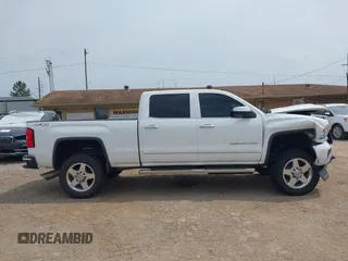 2015 GMC Sierra 2500HD Denali z VIN 1GT120E89FF190917, wystawiony jako IAAI lot #42271537 z przebiegiem 149 307 mil mil oraz . Historia ofert i sprzedaży dostępna na DreamBid. Obrazek 14.
