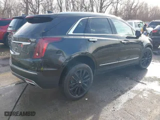2021 Cadillac XT5 AWD Premium Luxury with VIN 1GYKNDRS0MZ135660, listed as a IAAI auction lot 41123089 with 26,361 mi miles. Bid and sale history available at carsss.com. Image 4.