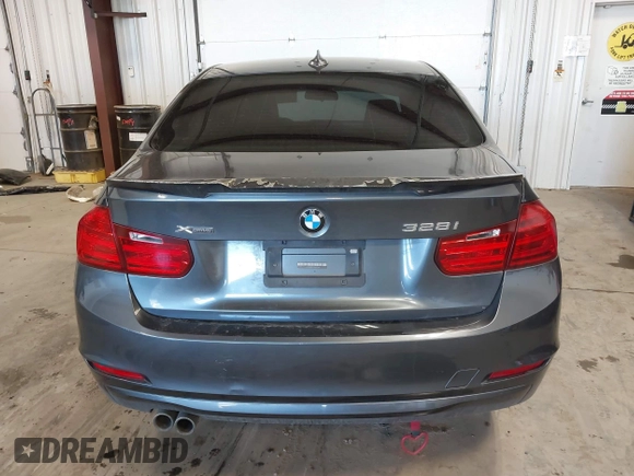 2015 BMW 3 Series 328i xDrive with VIN WBA3B5G53FNS17413, listed as a IAAI auction lot 41643479 with 99,065 mi miles. Bid and sale history available at carsss.com. Image 16.