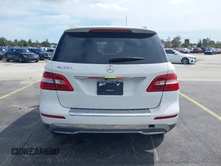 2015 Mercedes-Benz M 350 with VIN 4JGDA5JB9FA590659, listed as a IAAI auction lot 40591295 with 117,825 mi miles and . Bid and sale history available at DreamBid. Image 16.