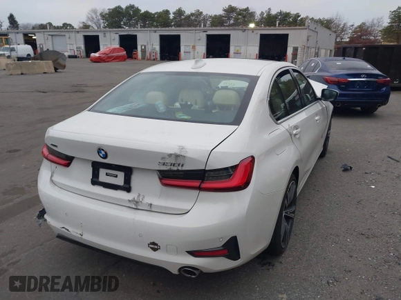 2021 BMW 3 Series 330i xDrive with VIN 3MW5R7J03M8B65004, listed as a IAAI auction lot 41244134 with Not Provided miles and . Bid and sale history available at DreamBid. Image 4.