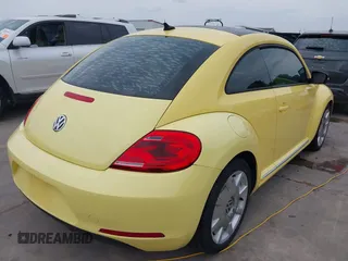 2013 Volkswagen Beetle 2.5L with VIN 3VWHX7AT7DM604449, listed as a IAAI auction lot 42406666 with 104,874 mi miles and . Bid and sale history available at DreamBid. Image 4.