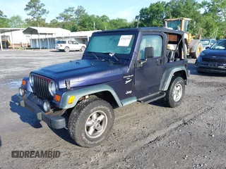 1998 Jeep Wrangler Sport with VIN 1J4FY19S8WP798559, listed as a IAAI auction lot 42162734 with 129,638 mi miles and . Bid and sale history available at DreamBid. Image 2.