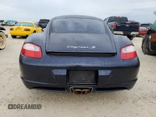2006 Porsche Cayman S с VIN WP0AB29836U781164, выставлен на аукционе Copart как лот 74904904 с пробегом 130 705 миль миль и Списание • Salvage title. История ставок и продаж доступна на DreamBid. Изображение 6.