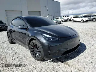 2024 Tesla Model Y Performance z VIN 7SAYGDEF6RF166365, wystawiony jako Copart lot #48885585 z przebiegiem Nie podano mil oraz Szkoda całkowita • Salvage title. Historia ofert i sprzedaży dostępna na DreamBid. Obrazek 11.