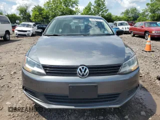 2014 Volkswagen Jetta S with VIN 3VW2K7AJ9EM250647, listed as a Copart auction lot 65387915 with 138,803 mi miles and Clean title. Bid and sale history available at DreamBid. Image 5.