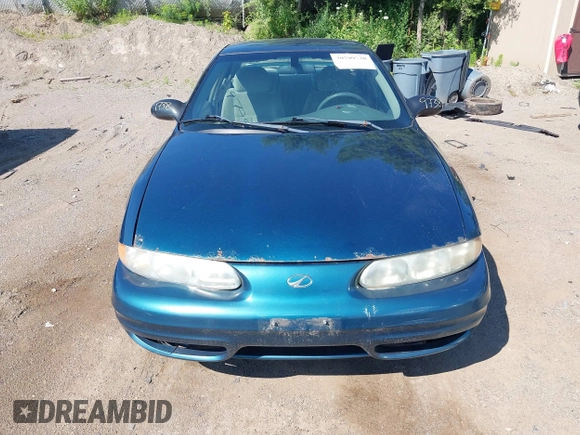 2003 Oldsmobile Alero GL1 z VIN 1G3NL52F53C153441, wystawiony jako IAAI lot #39799738 z przebiegiem 180 025 mil mil oraz . Historia ofert i sprzedaży dostępna na DreamBid. Obrazek 6.