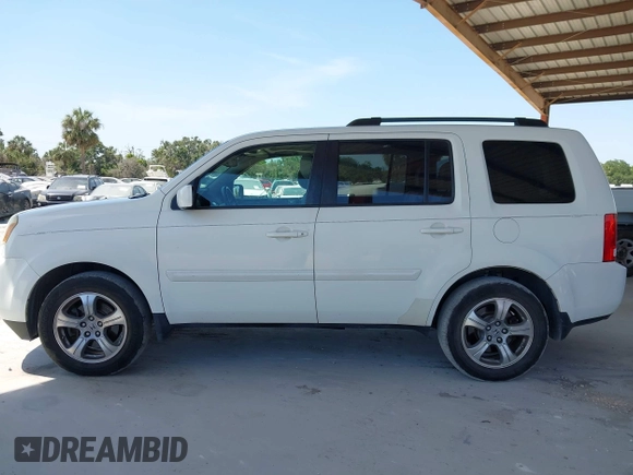 2012 Honda Pilot EX-L with VIN 5FNYF3H58CB014754, listed as a IAAI auction lot 42120220 with 166,783 mi miles. Bid and sale history available at carsss.com. Image 14.