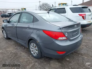 2015 Hyundai Accent GLS with VIN KMHCT4AE0FU929088, listed as a IAAI auction lot 41993359 with 149,958 mi miles. Bid and sale history available at carsss.com. Image 3.