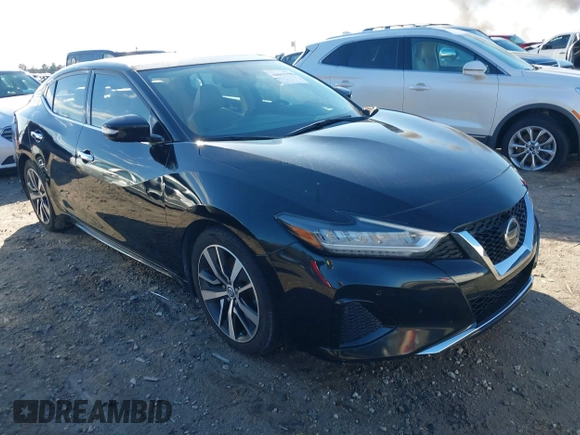 2019 Nissan Maxima Platinum z VIN 1N4AA6AV0KC379524, wystawiony jako IAAI lot #40862758 z przebiegiem 74 145 mil mil oraz . Historia ofert i sprzedaży dostępna na DreamBid. Obrazek 1.