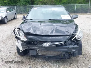 2017 Hyundai Accent SE z VIN KMHCT4AE7HU363918, wystawiony jako IAAI lot #42331712 z przebiegiem 85 123 mil mil oraz . Historia ofert i sprzedaży dostępna na DreamBid. Obrazek 13.