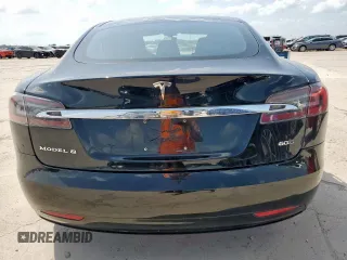 2016 Tesla Model S 90D с VIN 5YJSA1E21GF168439, выставлен на аукционе Copart как лот 60703035 с пробегом 102 905 миль миль и Списание • Salvage title. История ставок и продаж доступна на DreamBid. Изображение 6.