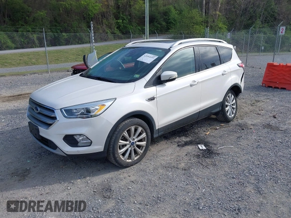 2017 Ford Escape Titanium with VIN 1FMCU9JD9HUB40135, listed as a IAAI auction lot 42054533 with 68,255 mi miles. Bid and sale history available at carsss.com. Image 18.