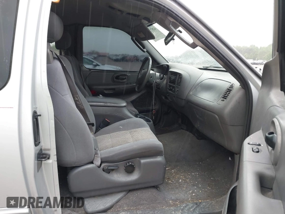 2003 Ford F-150 XL with VIN 1FTRX17253NA74389, listed as a IAAI auction lot 42072045 with 166,572 mi miles. Bid and sale history available at carsss.com. Image 5.