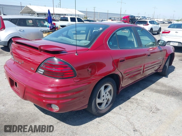 1999 Pontiac Grand Am SE2 with VIN 1G2NE52T0XM702788, listed as a IAAI auction lot 42564414 with 195,067 mi miles and . Bid and sale history available at DreamBid. Image 4.