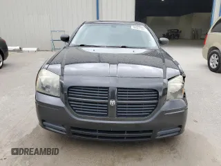 2005 Dodge Magnum SE with VIN 2D4FV48V65H510653, listed as a Copart auction lot 70927144 with 105,350 mi miles and Salvage Title. Bid and sale history available at carsss.com. Image 5.