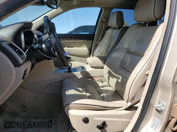 2015 Jeep Grand Cherokee Overland with VIN 1C4RJFCT5FC913728, listed as a Copart auction lot 51605375 with 180,452 mi miles and Salvage Title. Bid and sale history available at carsss.com. Image 7.