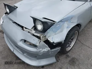 1992 Mazda MX-5 Miata z VIN JM1NA3514N0314487, wystawiony jako IAAI lot #42036631 z przebiegiem 125 882 mil mil oraz . Historia ofert i sprzedaży dostępna na DreamBid. Obrazek 6.