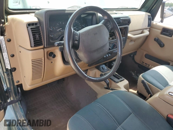 2000 Jeep Wrangler Sahara with VIN 1J4FA59S2YP750795, listed as a Copart auction lot 52353503 with 0 mi miles and Salvage Title. Bid and sale history available at carsss.com. Image 8.