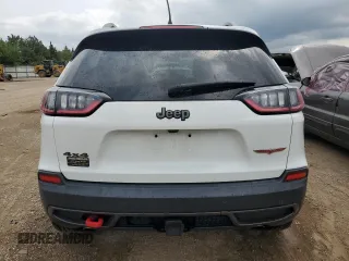 2019 Jeep Cherokee Trailhawk Elite with VIN 1C4PJMBX7KD140720, listed as a Copart auction lot 64268064 with 61,747 mi miles and Salvage Title. Bid and sale history available at carsss.com. Image 6.