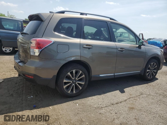 2017 Subaru Forester Touring with VIN JF2SJGWC9HH402713, listed as a Copart auction lot 62257345 with 128,903 mi miles and Salvage title. Bid and sale history available at DreamBid. Image 3.