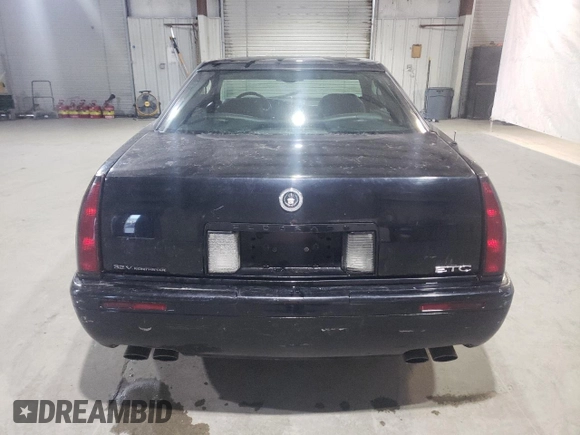 2000 Cadillac Eldorado Touring ETC z VIN 1G6ET1294YU144883, wystawiony jako Copart lot #80979854 z przebiegiem 89 271 mil mil oraz Czysty tytuł • Clean title. Historia ofert i sprzedaży dostępna na DreamBid. Obrazek 6.