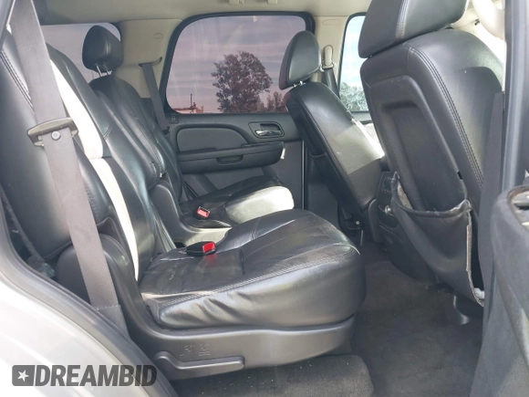 2007 Chevrolet Tahoe LTZ with VIN 1GNFC13077J399911, listed as a IAAI auction lot 41141878 with Not provided miles and . Bid and sale history available at DreamBid. Image 8.