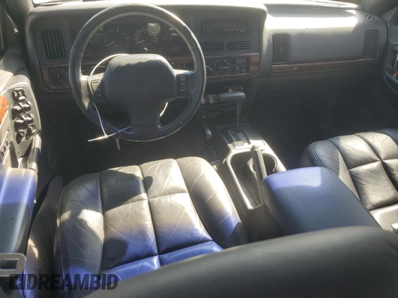 1998 Jeep Grand Cherokee Limited with VIN 1J4GZ78S5WC325148, listed as a Copart auction lot 67780424 with Not provided miles and Salvage title. Bid and sale history available at DreamBid. Image 8.