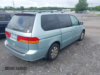 2004 Honda Odyssey EX-L with VIN 5FNRL18974B036430, listed as a IAAI auction lot 42715287 with 230,646 mi miles and . Bid and sale history available at DreamBid. Image 4.