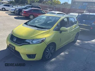 2015 Honda Fit EX-L z VIN 3HGGK5H83FM787047, wystawiony jako Copart lot #77851614 z przebiegiem 270 010 mil mil oraz Czysty tytuł • Clean title. Historia ofert i sprzedaży dostępna na DreamBid. Obrazek 2.