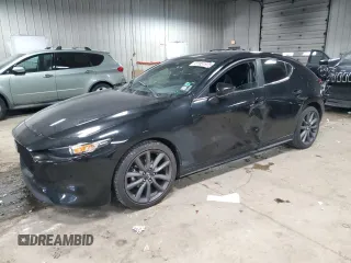 2019 Mazda Mazda3 Hatchback w/Preferred Pkg with VIN JM1BPAMM6K1141658, listed as a Copart auction lot 87951975 with 76,575 mi miles and Salvage Title. Bid and sale history available at carsss.com. Image 1.