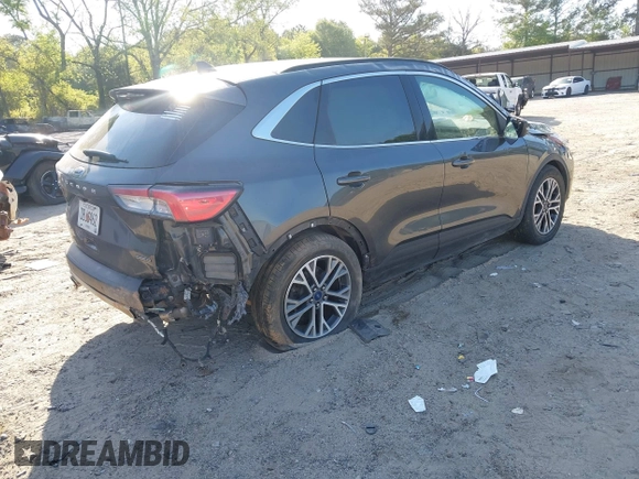 2020 Ford Escape Titanium Hybrid with VIN 1FMCU9DZ2LUA86600, listed as a IAAI auction lot 42059830 with 76,998 mi miles and . Bid and sale history available at DreamBid. Image 4.