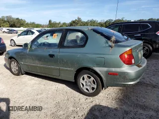 2005 Hyundai Accent GLS with VIN KMHCG35C75U328380, listed as a Copart auction lot 74935354 with 4,848 mi miles and Salvage Title. Bid and sale history available at carsss.com. Image 2.