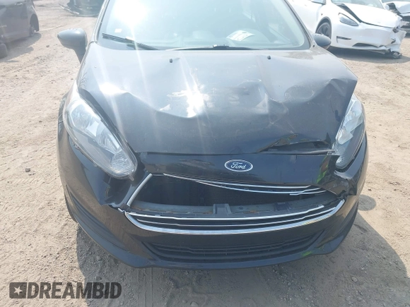 2015 Ford Fiesta S with VIN 3FADP4TJ4FM148740, listed as a IAAI auction lot 42413757 with 77,363 mi miles and . Bid and sale history available at DreamBid. Image 6.